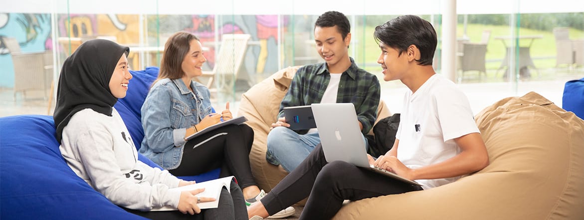 Sampoerna University students brainstorming and discussing a project